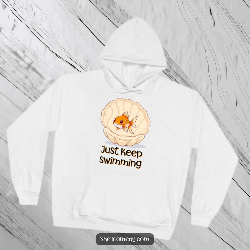 Funny Goldfish Hoodie: A happy goldfish joyfully swims through a vast, empty seashell, embracing its aquatic playground.