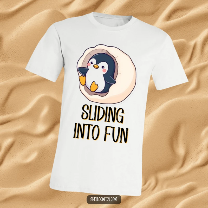 Funny Penguin T-Shirt: A playful penguin zooms down a smooth, polished seashell, embarking on a fun-filled slide.