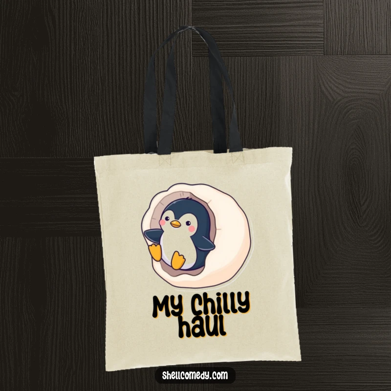 Funny Penguin Tote Bag: A playful penguin slides down a smooth, polished seashell, ready for winter adventures.